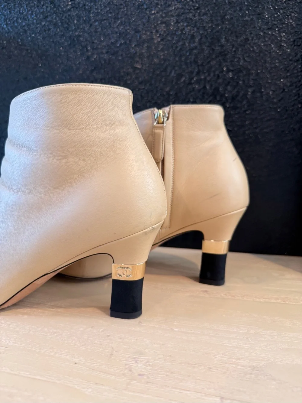 CHANEL Beige Leather Ankle Boots with Black Cap Toe